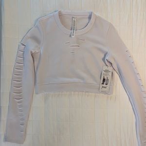 Alo yoga ripped warrior long sleeve sweater